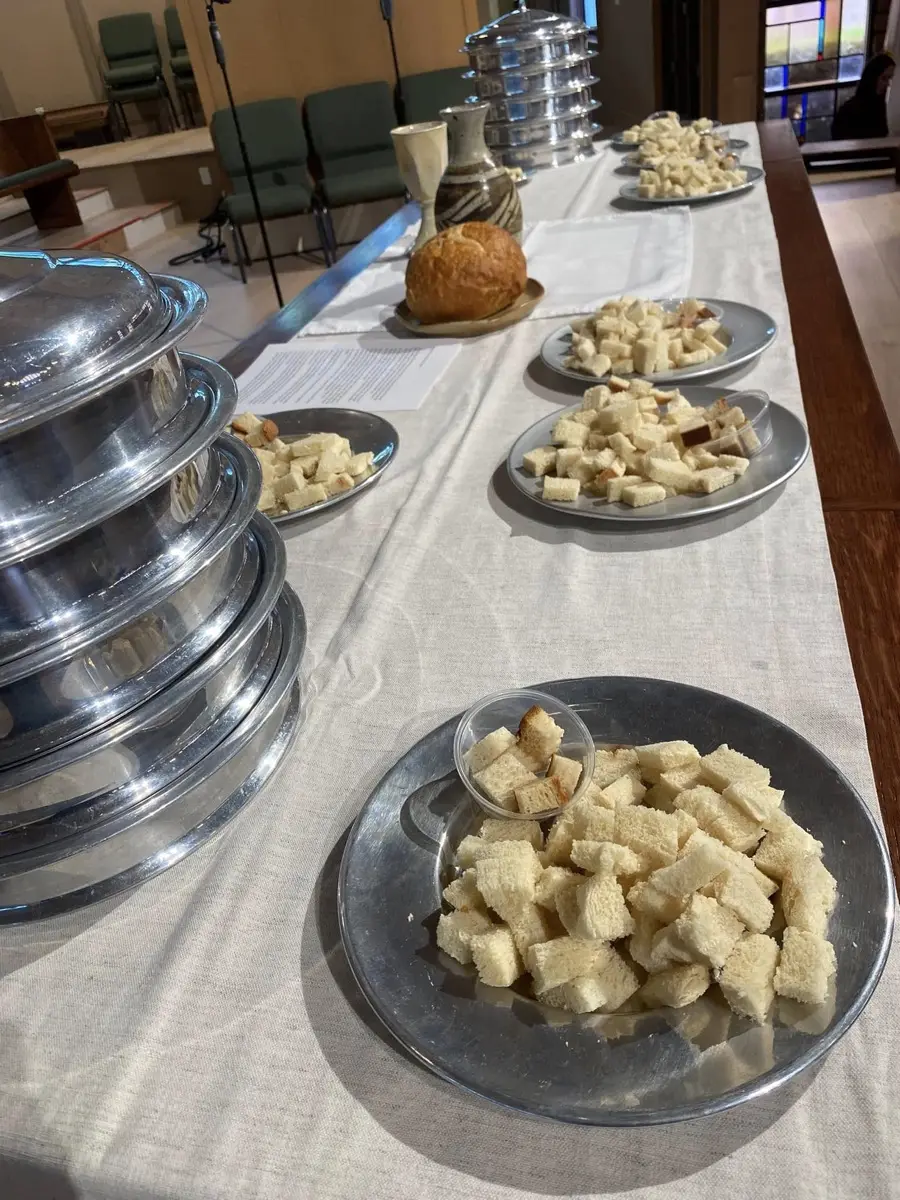 The communion loaf and trays on the PCLG communion table.