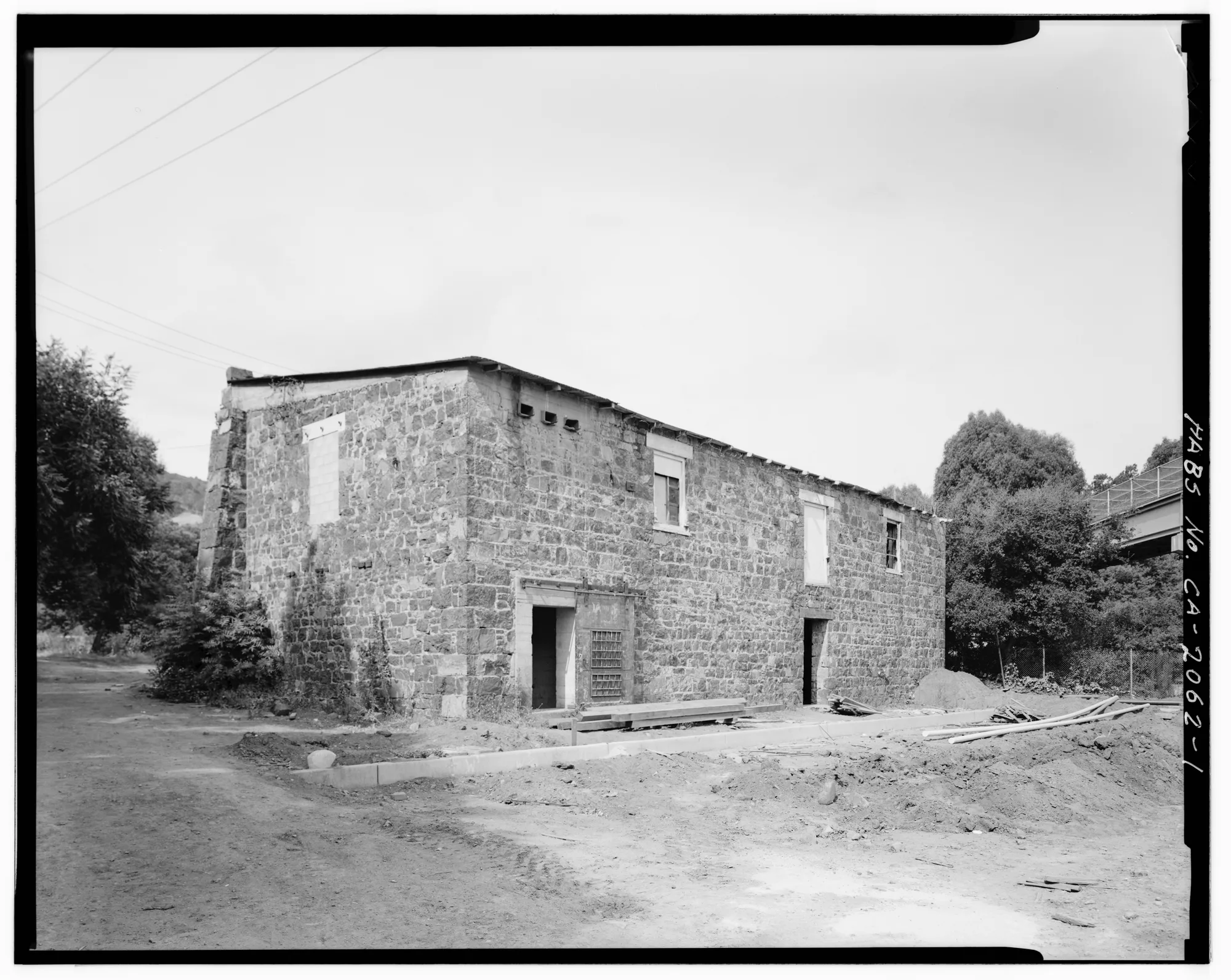 Stone walls of the Forbes Mill Addition at Church and East Main Streets, looking west.