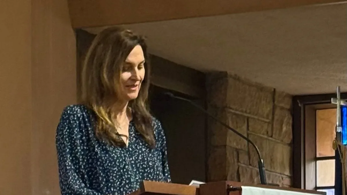 A PCLG member reading the lesson from the lectern in the Sanctuary.
