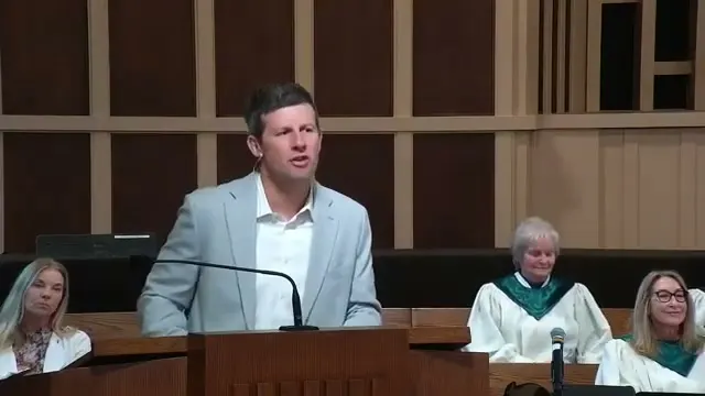 Rev. Dr. David G. Watermulder at the start of Blessed Are the Poor in Spirit